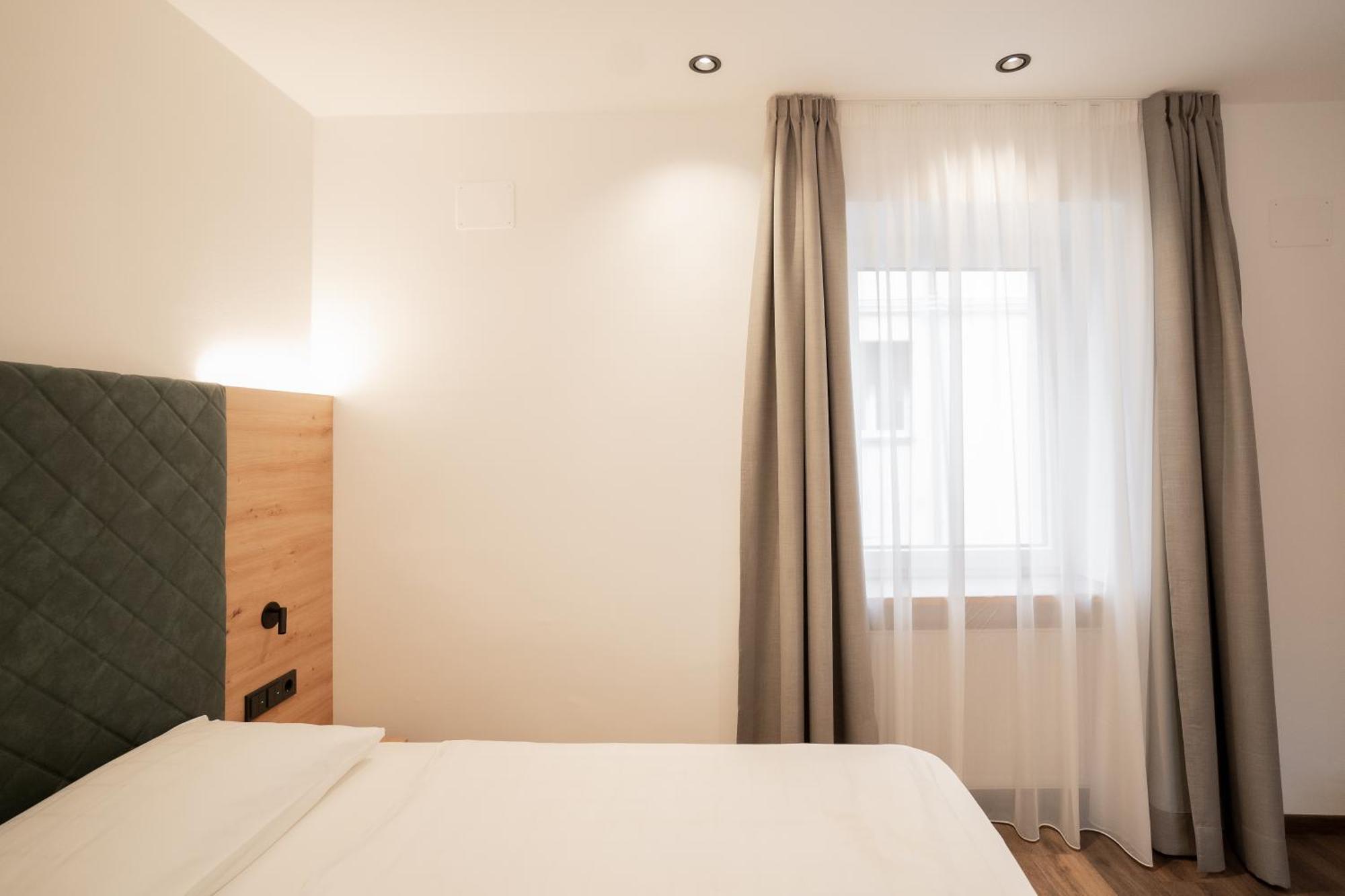 Feichter Hotel & Bistro Больцано Экстерьер фото